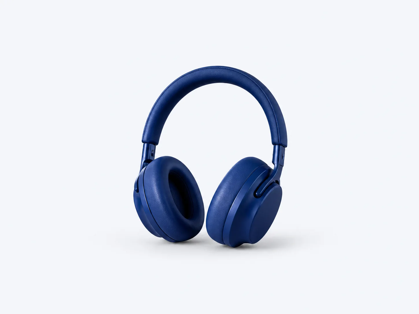 Blue headphones isolated on a clean light ecommerce background